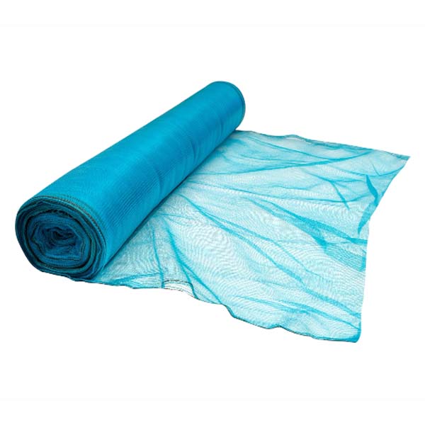 Blue heavy duty plastic debris netting fitted to scaffolding on a construction site