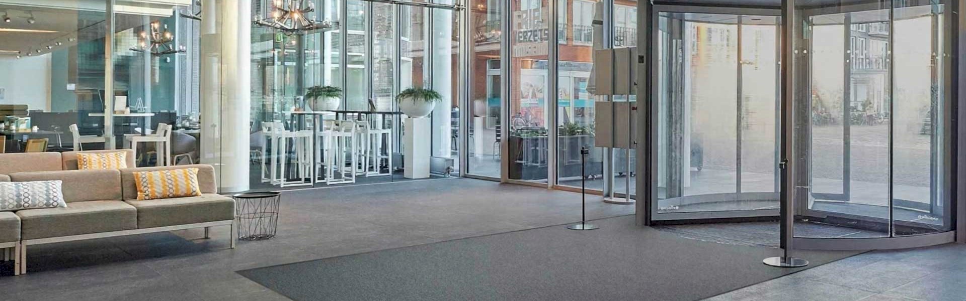 Top 5 anti-slip mats including industrial, bathroom, kitchen, and entrance mats shown in real-world settings